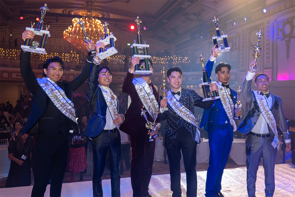 Mr. Philippines UK 2025 finalists holding their trophies in celebration after the event.